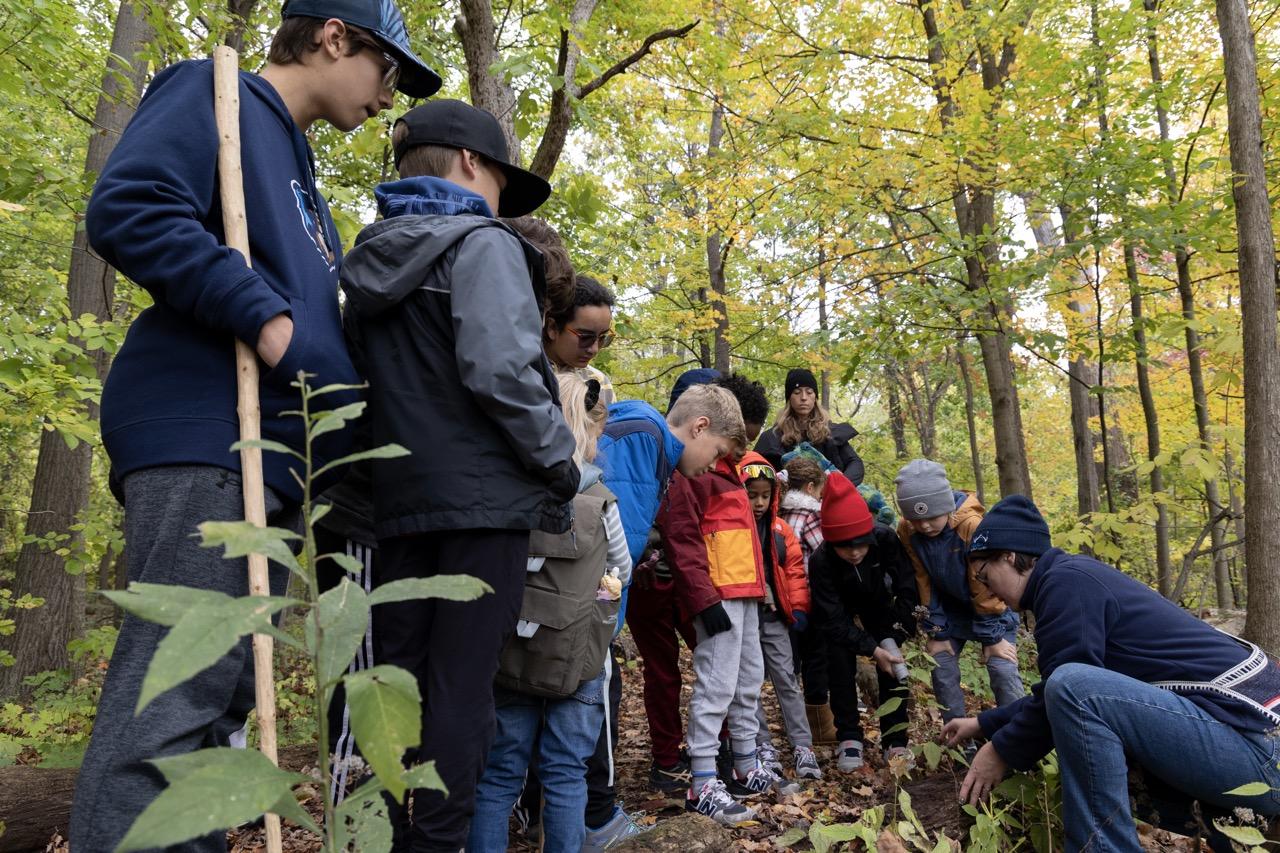 a field trip of students on a trail at the EIC in Dearborn MI