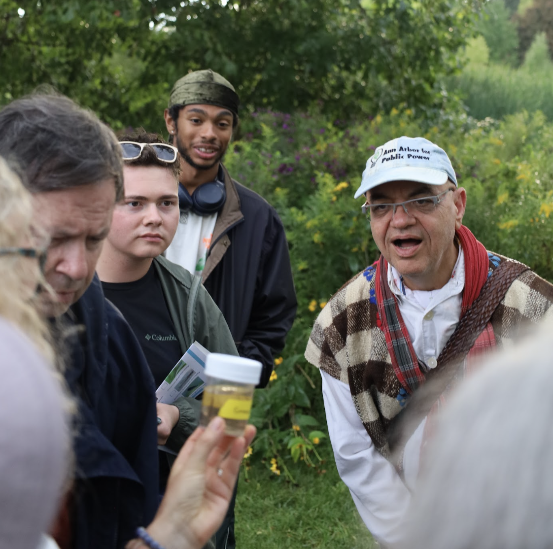 people surprised looking at water samples