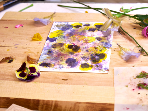 flowers pounded into paper for design 