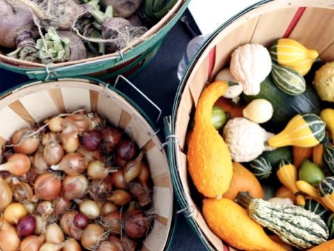 three baskets of vegetables 