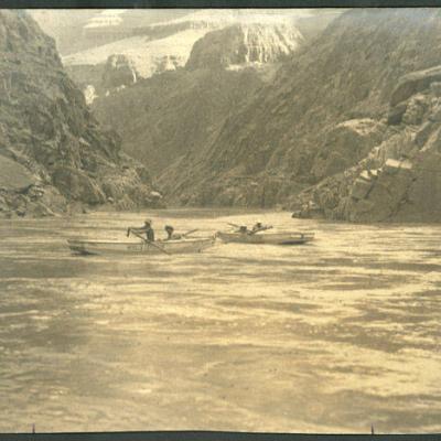 old black and white photo of boats on river